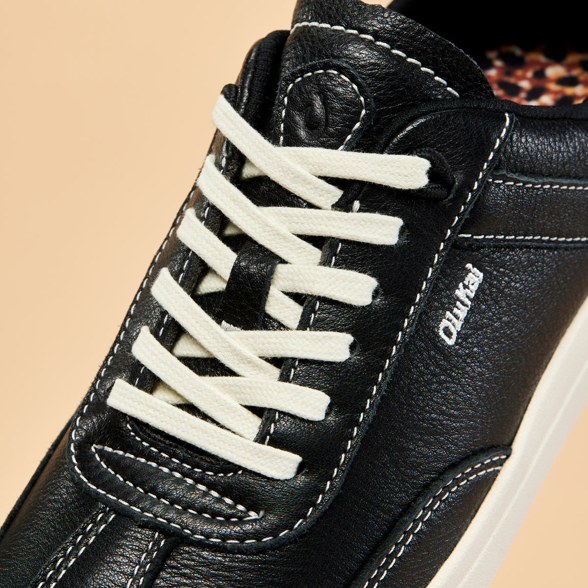 Hā‘upu Women’s Leather Sneakers - Onyx